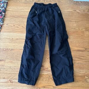 REI RAIN PANTS KIDS 12/14 L BLACK ZIP ANKLE  TAB WATERPROOF  UNISEX